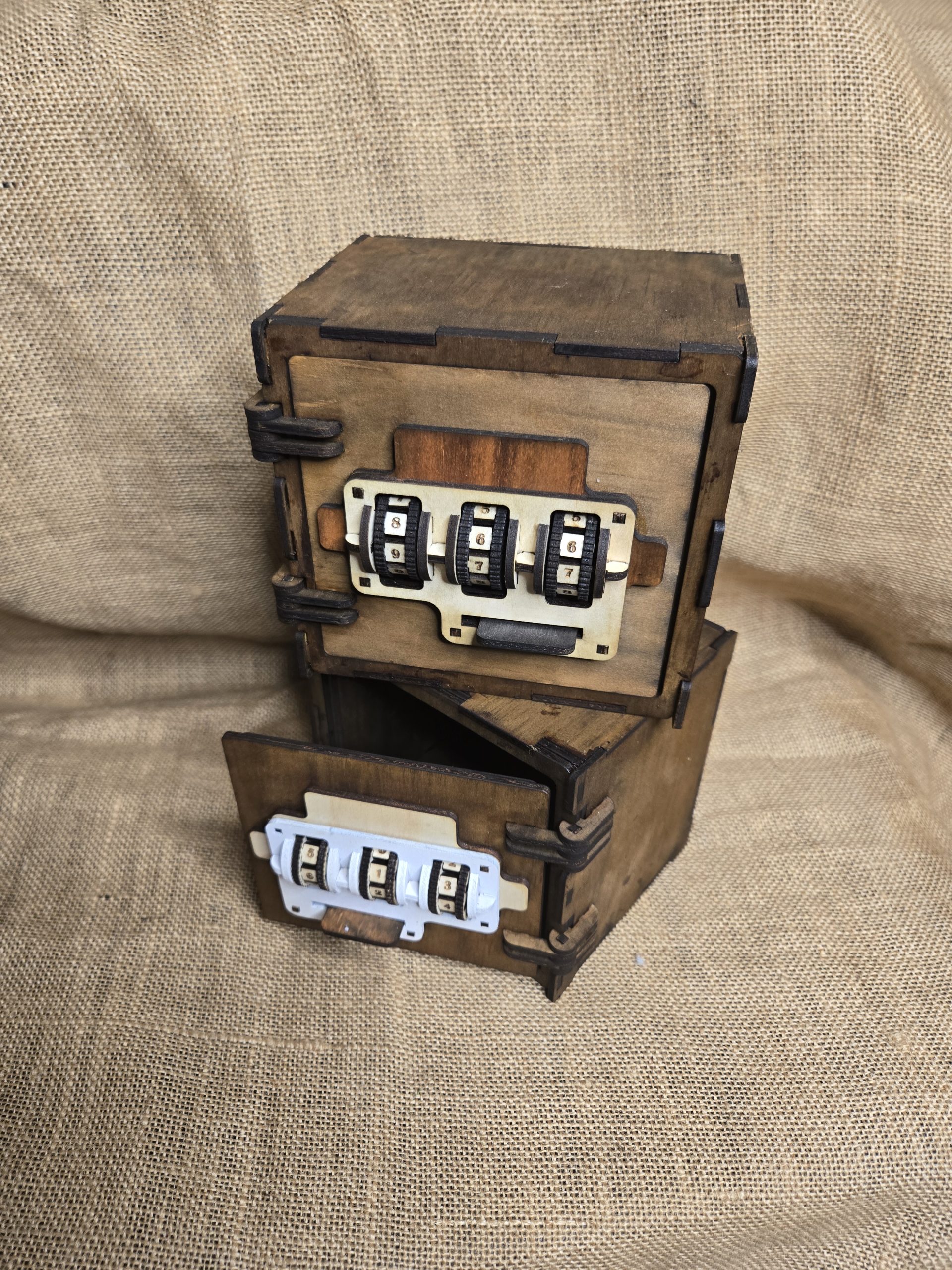 Wooden combination safe puzzle box with a three-number code, opening once the correct combination is solved.