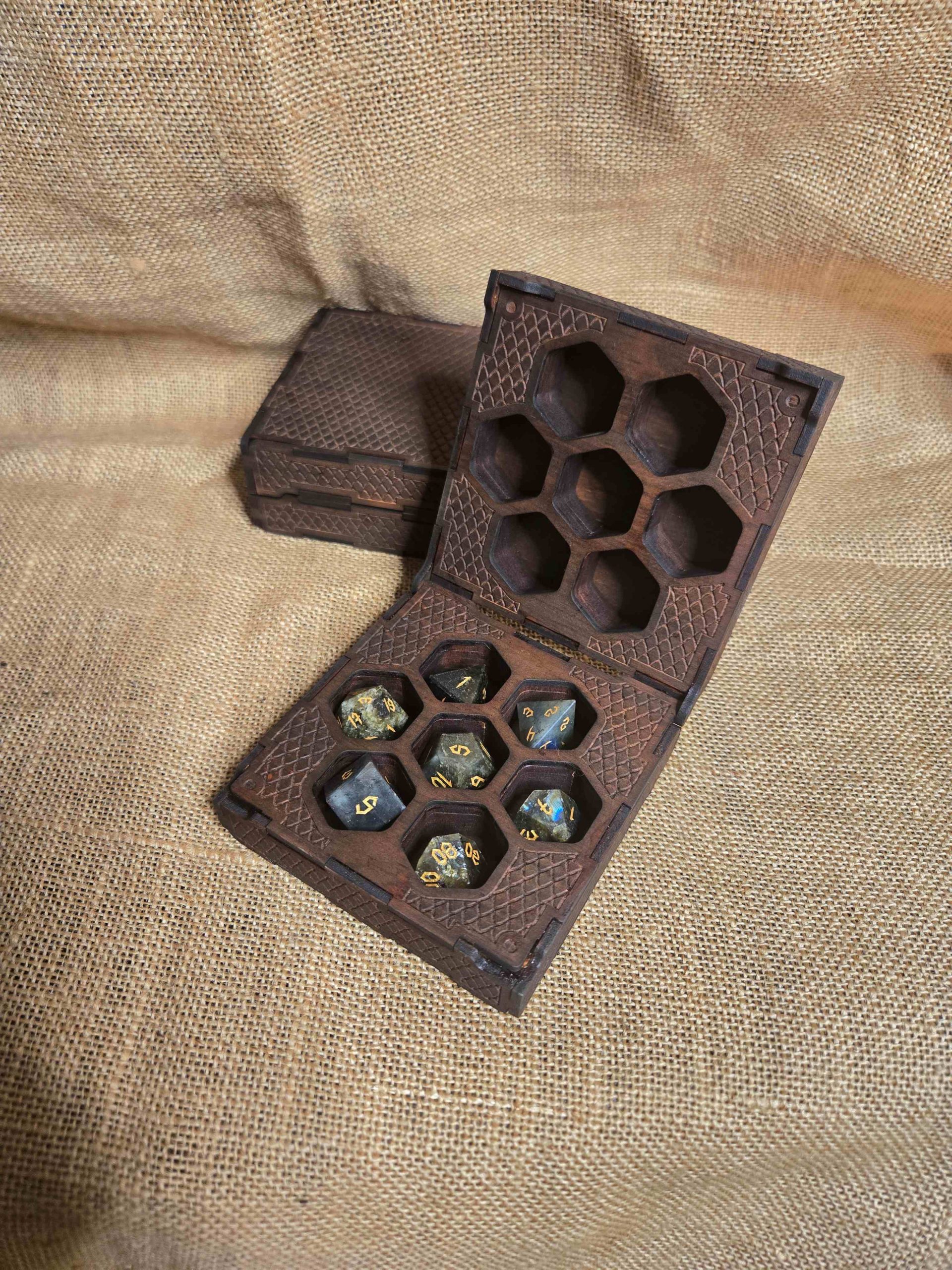 Handcrafted wooden dice box of the same size with fine dragon scale engraving, offering an alternate fantasy design.