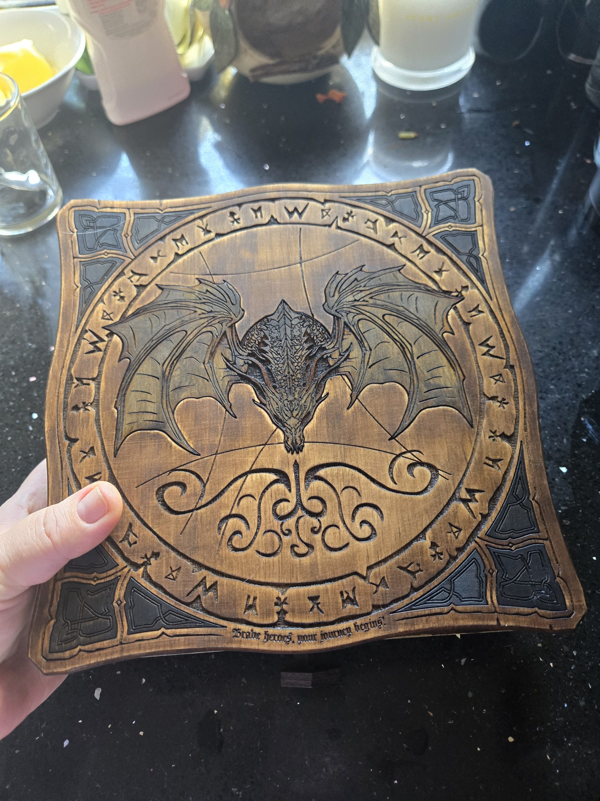 Large handcrafted wooden jewellery box with engraved dragon design, featuring sliding drawers with compartments for valuables, dice or foam-lined storage.