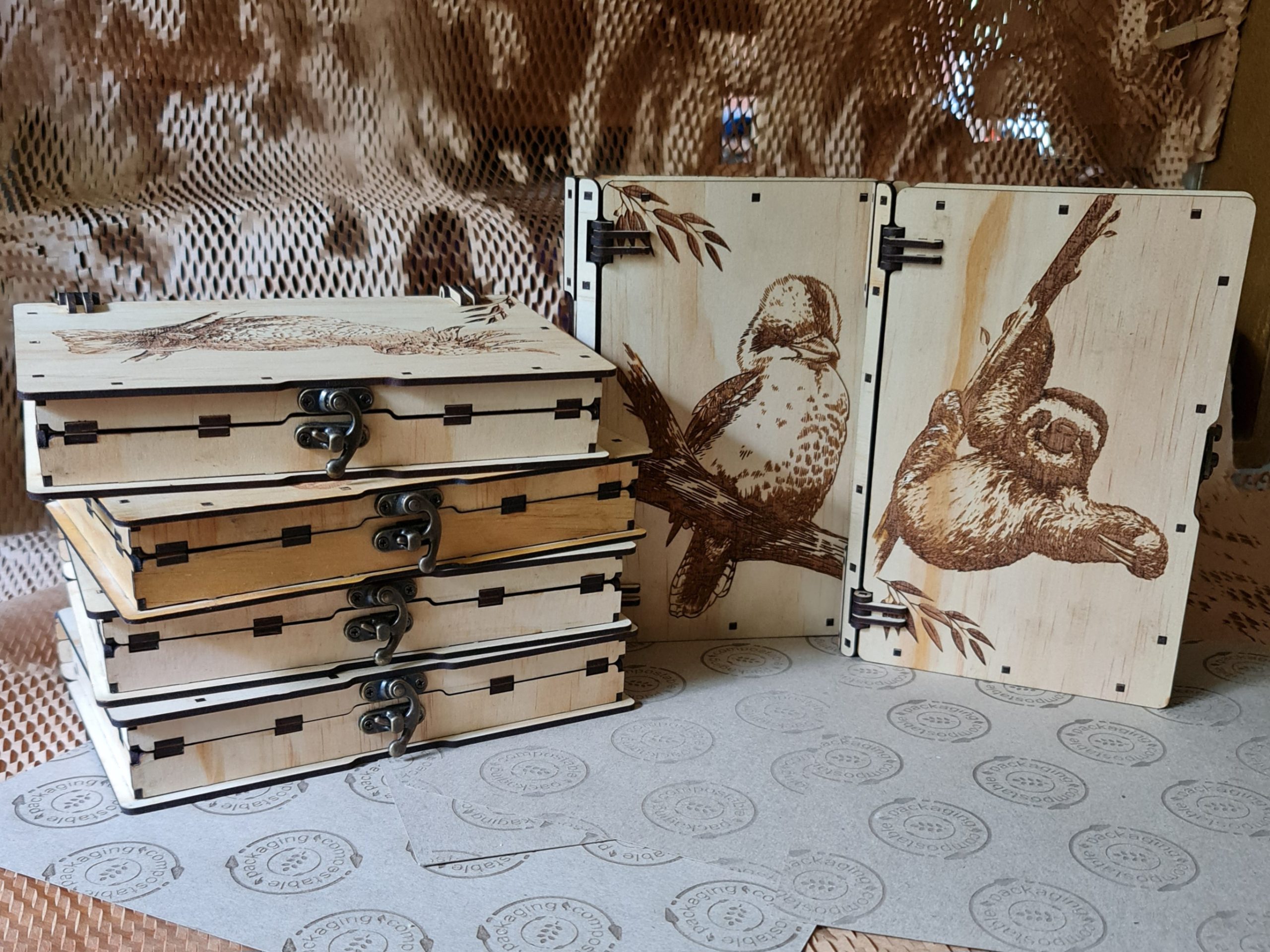 Natural-finish wooden book boxes made from Australian timber, displayed to show customisable designs and finishes.