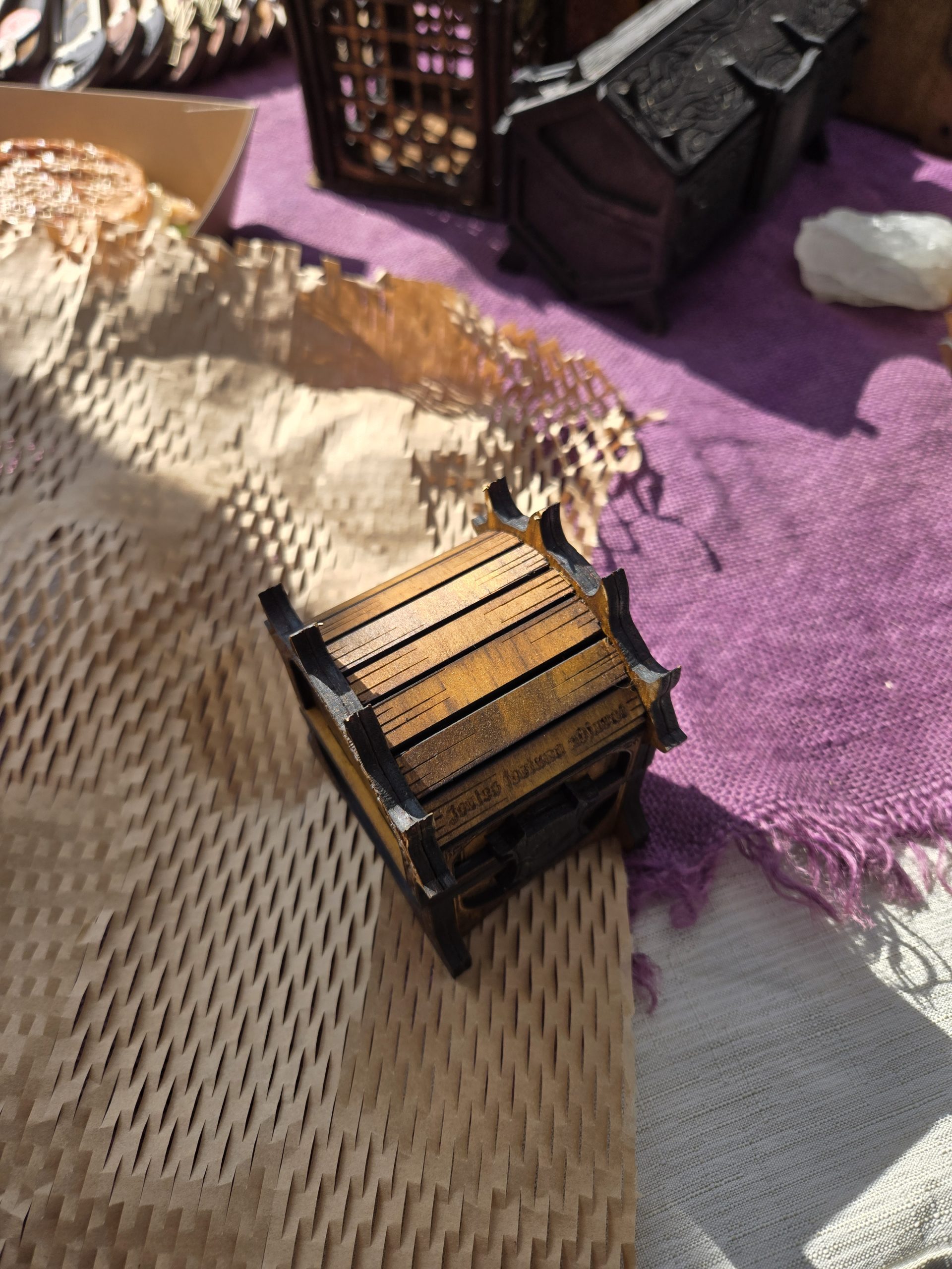 Handcrafted wooden dragon chest engraved with the Latin phrase “Fortes fortuna adiuvat,” meaning fortune favours the brave.